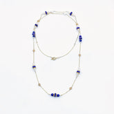 Комплект из колье и серег с девятью лазуритами и жемчугом